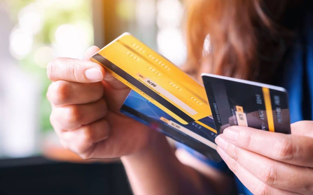 Closeup of a woman holding multiple credit cards