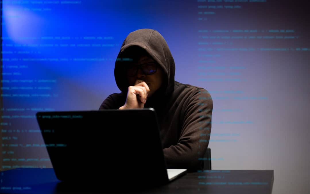Hacker hooded dangerous hacking information government data servers and get password for insert their virus to system. "rUnlock and break down personal data and software.