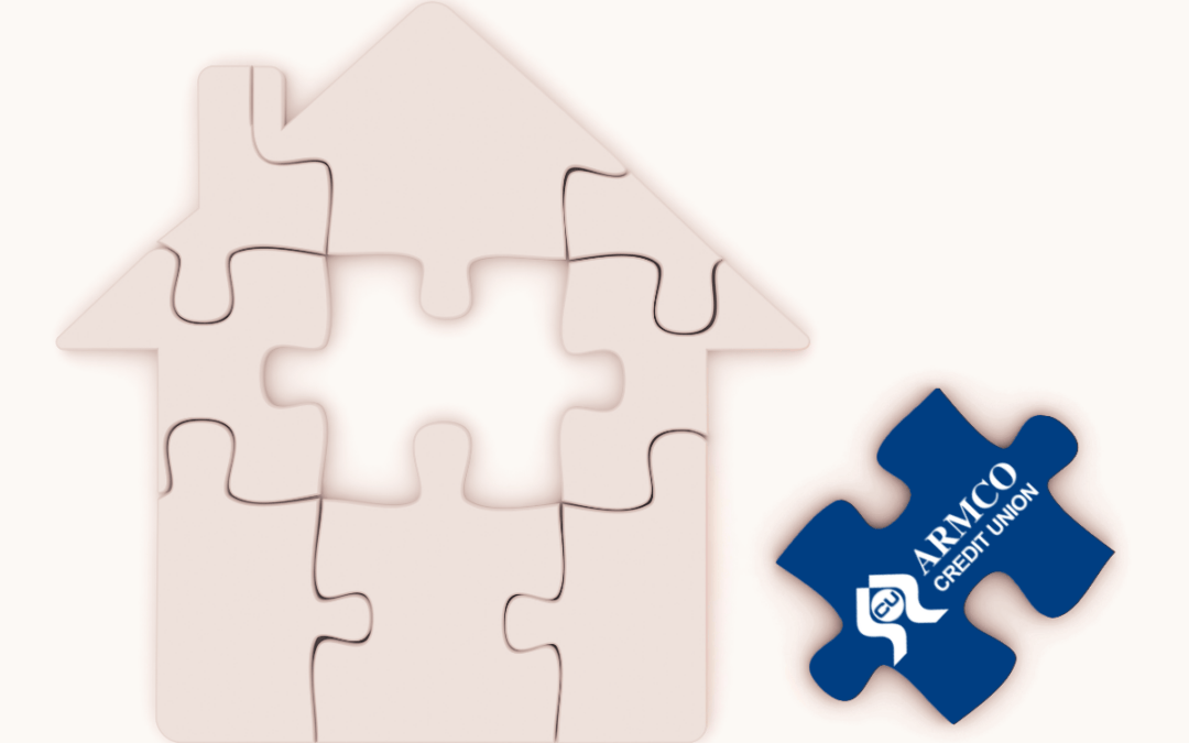 picture of a puzzle in the shape of a house. There is a missing piece located beside the house with an Armco Credit Union logo.
