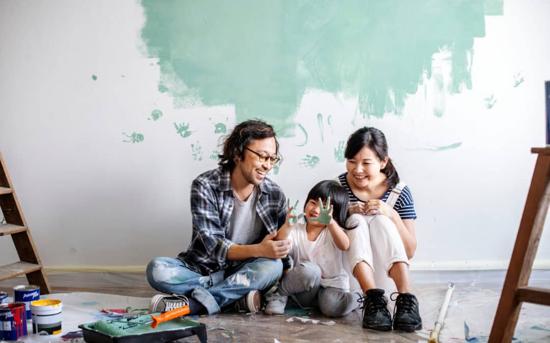 Family painting their home